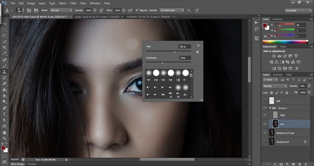 Use the clone stamp tool to remove imperfections in the “high” layer…